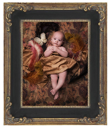vintage-style baby portrait with tapestry, feathers, butterflies, and silk